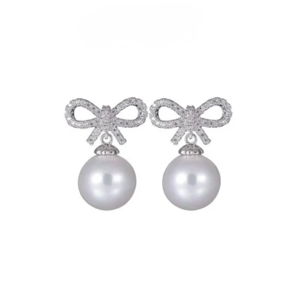 [Zyrono] Bow-shaped And Synthetic Pearl women's earrings CDE3101SV Free Shipping