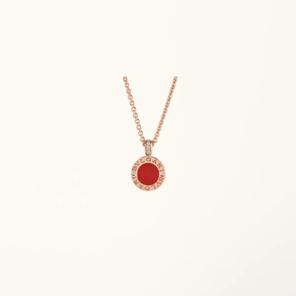 [ZYRONO] BVLGARI NECKLACE WITH 18 KT ROSE GOLD CHAIN AND PENDANT, SET WITH CARNELIAN AND MOTHER-OF-PEARL DISCS AND WITH DETAILS IN PAVÉ DIAMONDS.